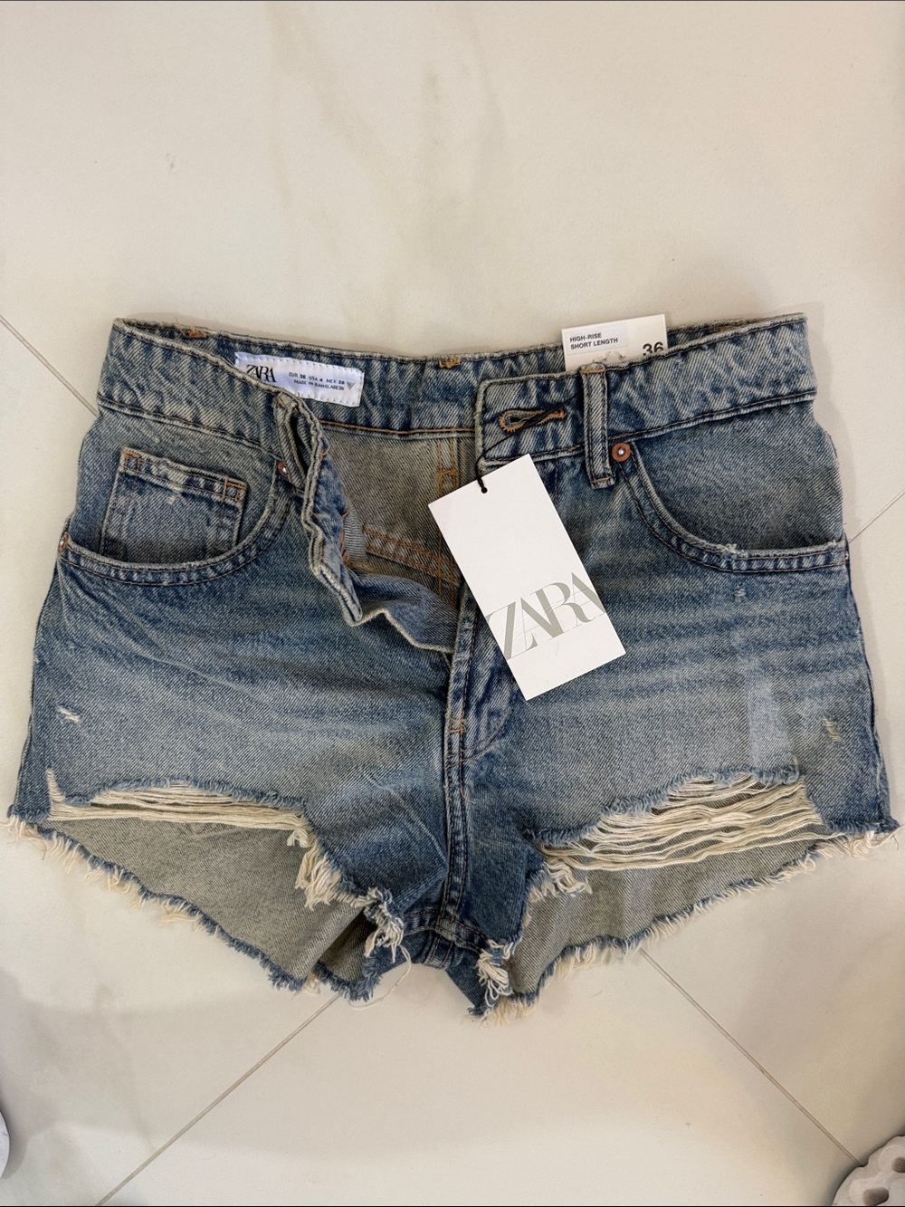 ZARA Light Blue Distressed Denim Cutoff Shorts
